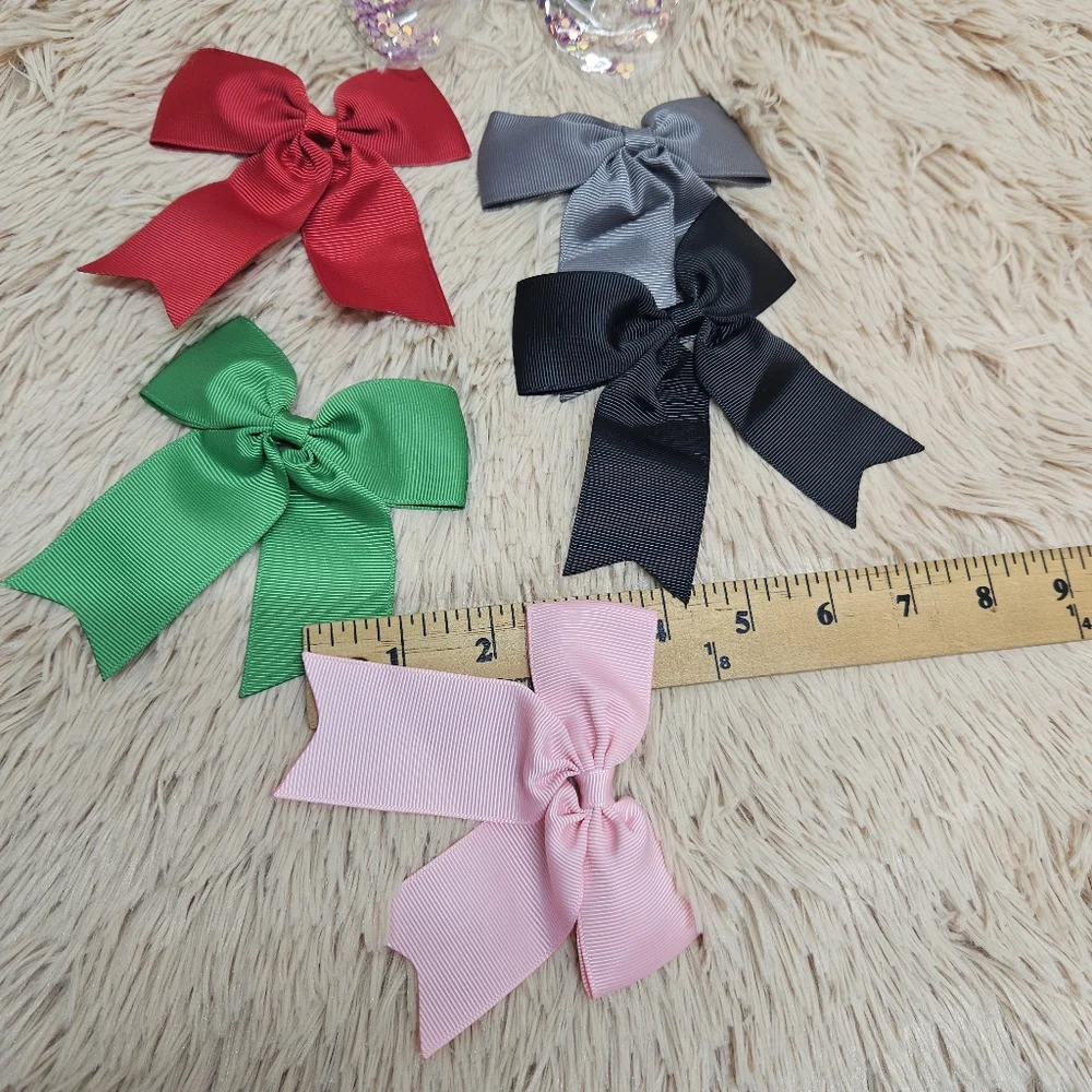 Girls' hair clip bows, solid colors.